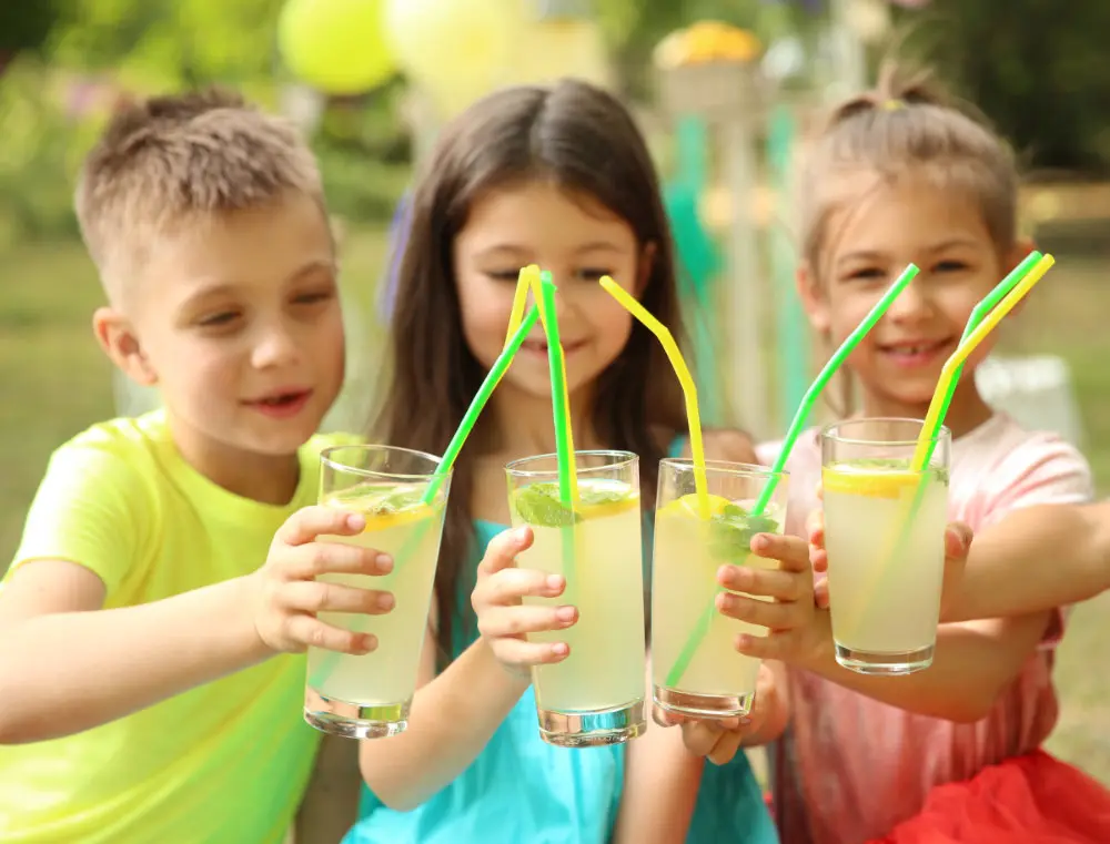 How to help your baby drink from an open cup or straw
